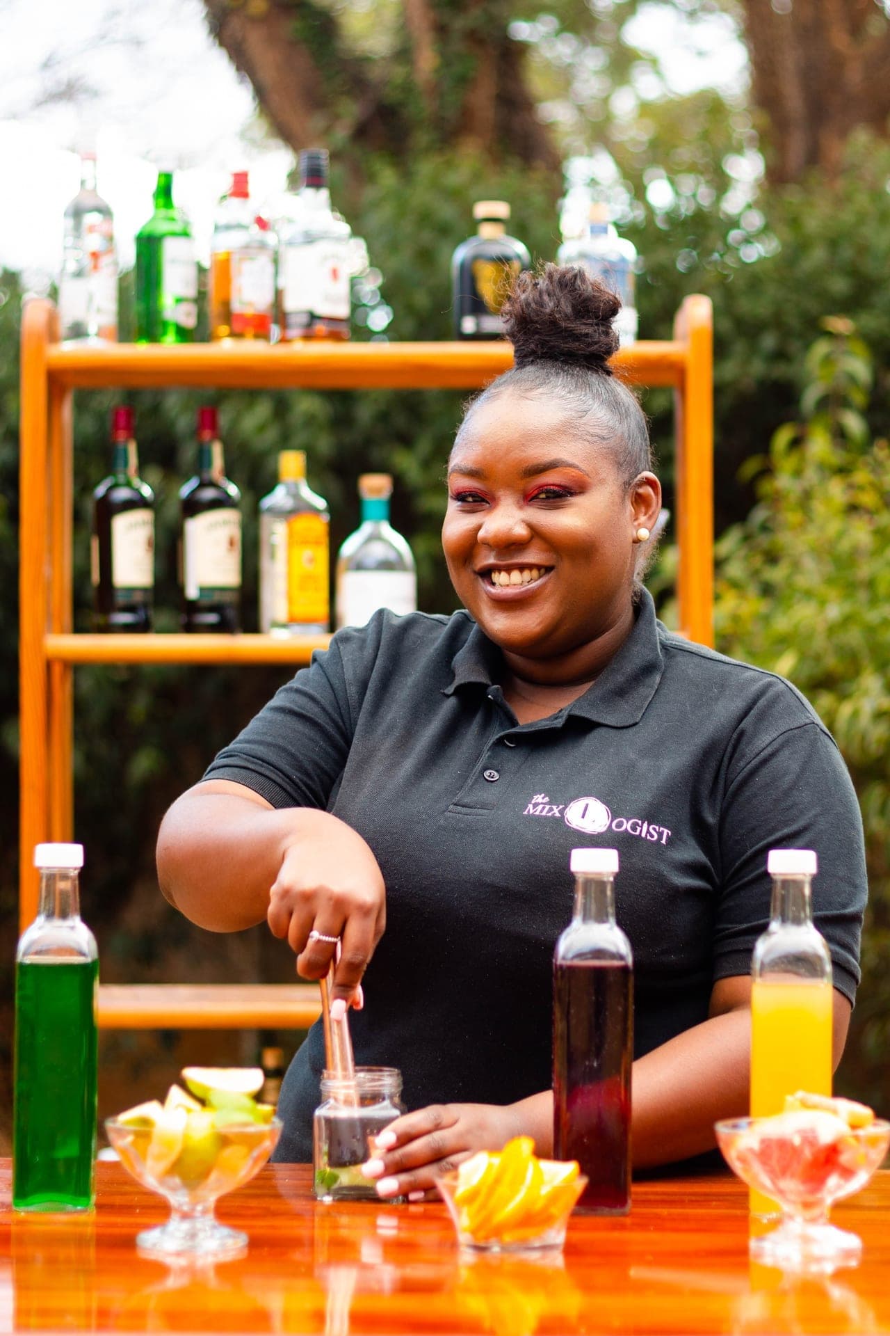 Portrait of Ashler Jaya, founder of The Mixologist ZW